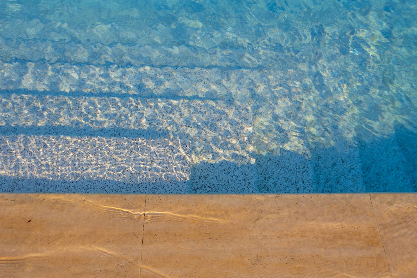 swimming pool for swimming in summertime heat by yilmazsavaskandag