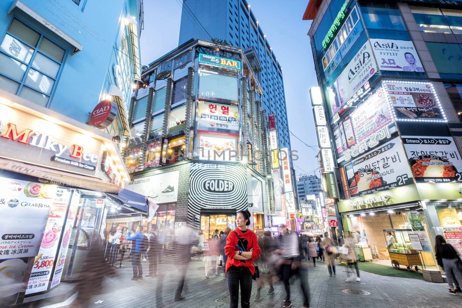 SEOUL, SOTH KOREA, 29 MARCH 2018 : Korean people and tourist walking around Myeong-dong  at night for shopping and eating. Myeong-dong is famous shopping destinations in Seoul, South Korea,