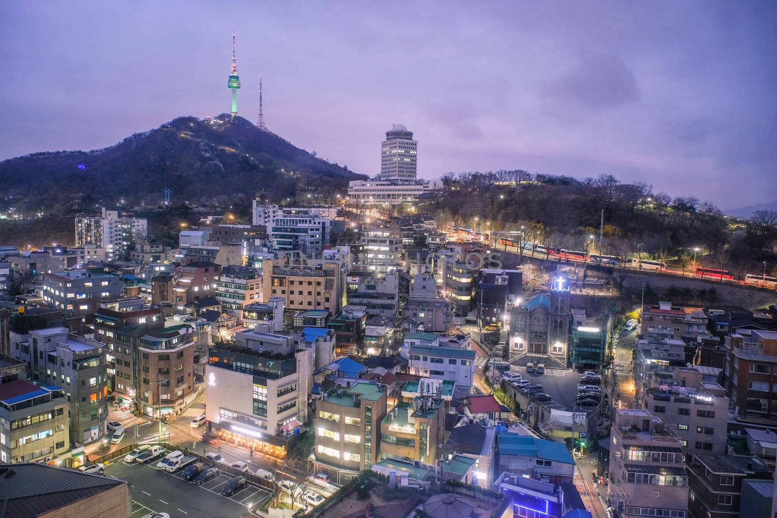 Cityscape night view of Seoul and Namsan Seoul Tower, South Kore by Surasak