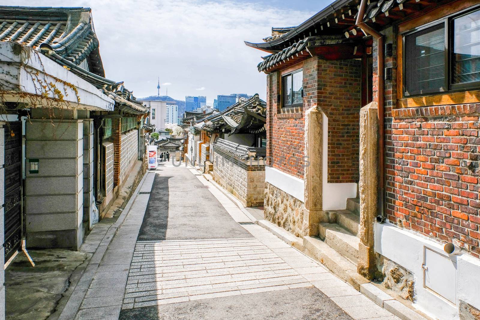 Bukchon Hanok Village And Seoul tower in daylight at Seoul, Sout by Surasak