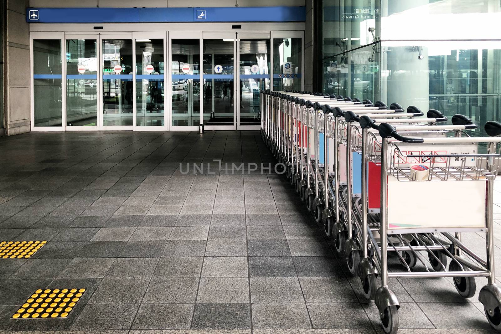 Trolley in front of The airport  by Surasak