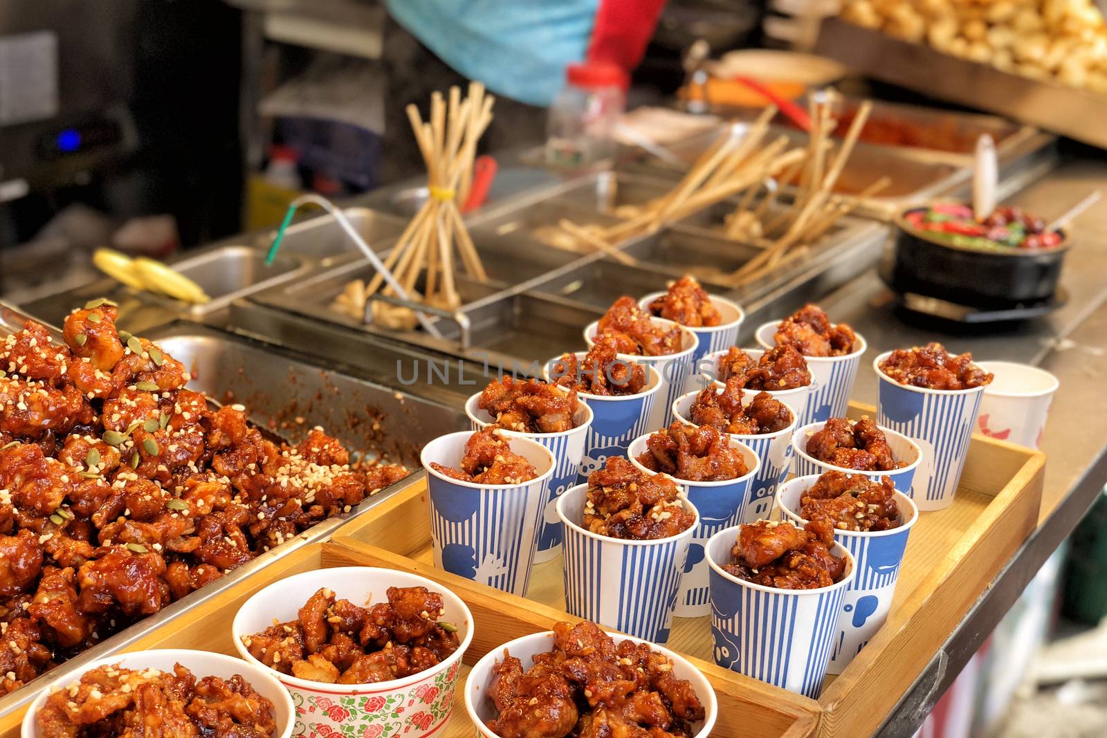 Chicken fried in Myeong-dong street food, Seoul, South Korea by Surasak