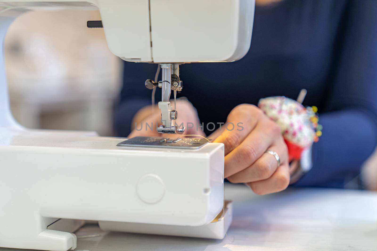 thread replacement in a sewing machine for stapling fabric.