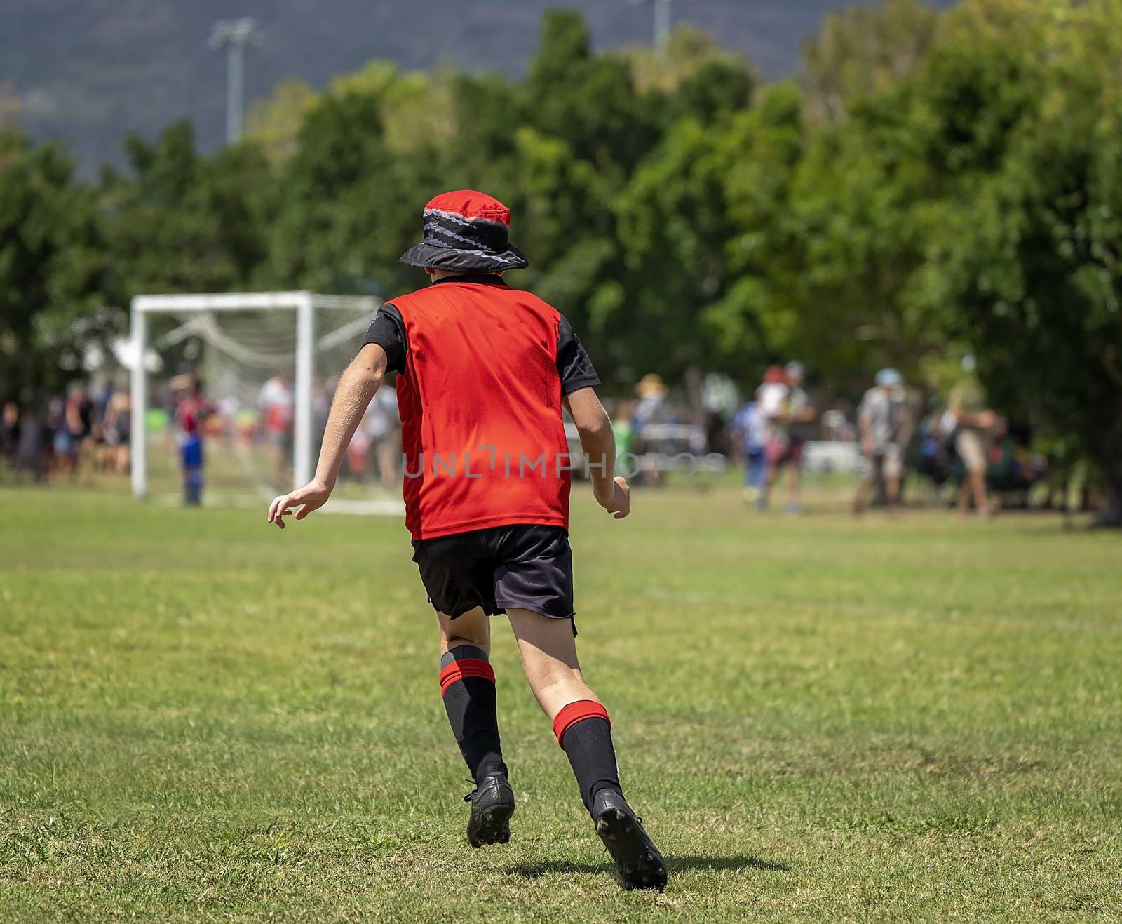 Young Soccer Player Learning The Game by 	JacksonStock