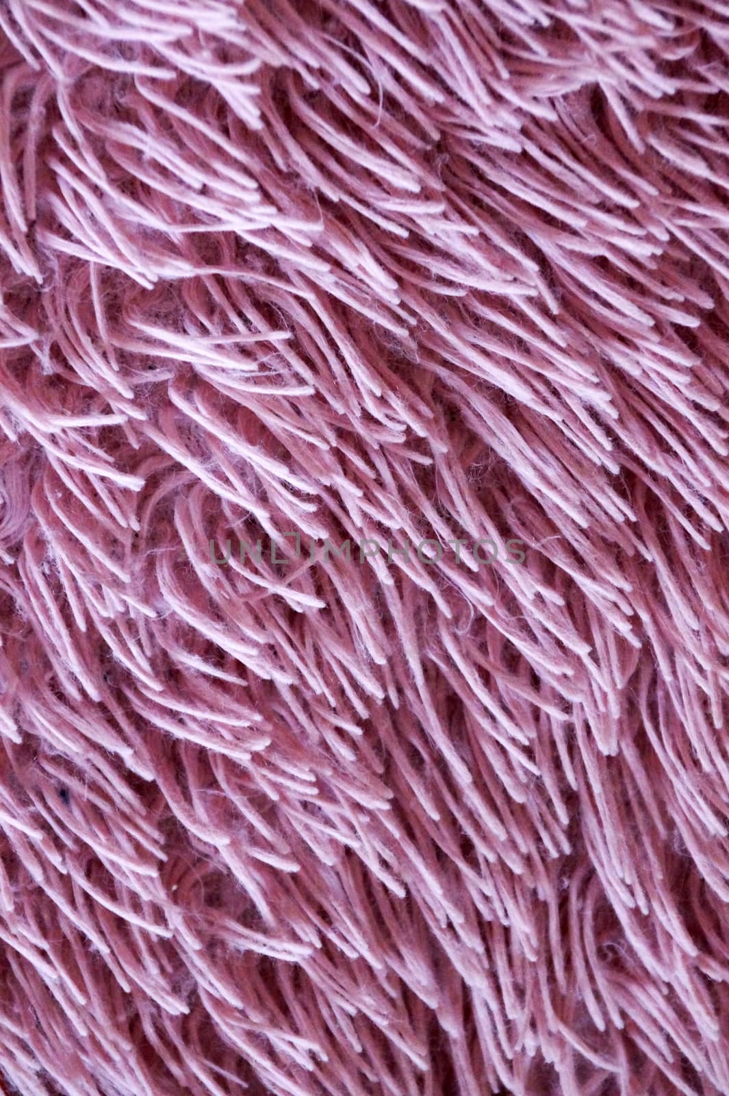 faux pink fur, vertical texture for background.