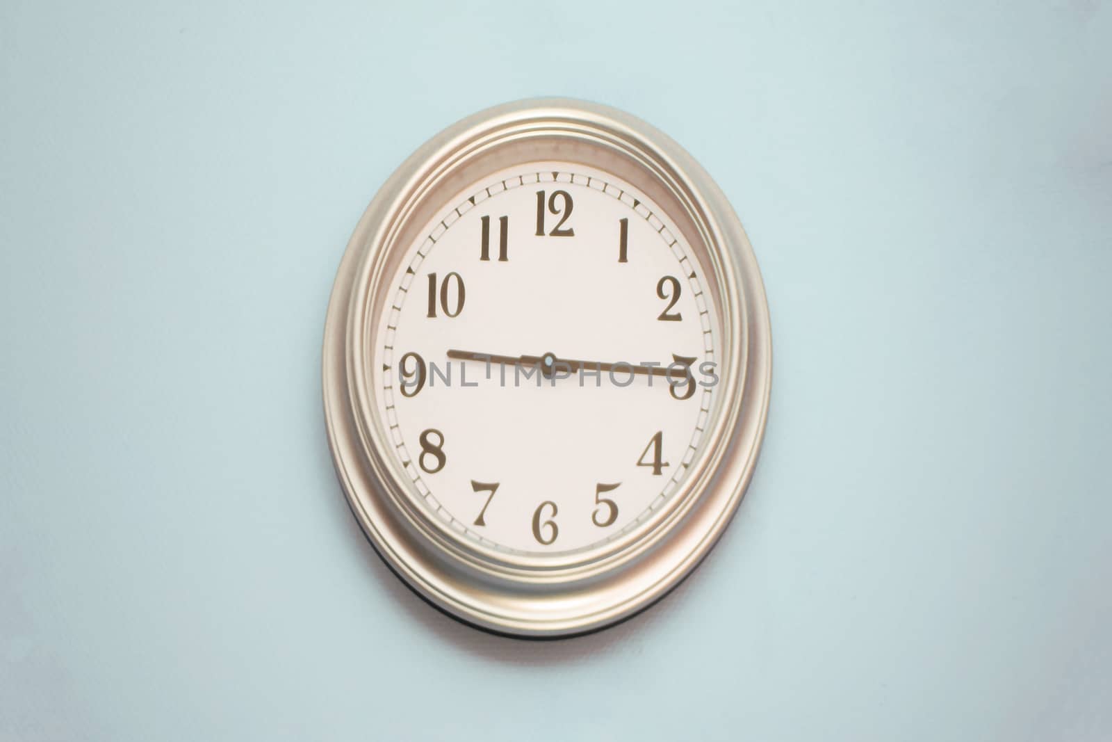 Wall clock. On blue background. View from front. by Essffes