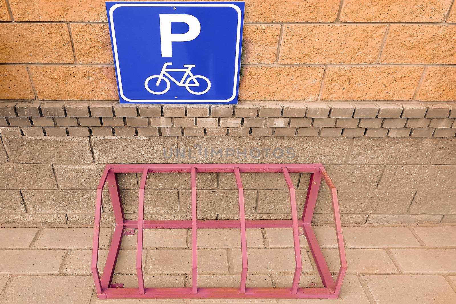 Bicycle parking and road sign. View from the front. In the city near the house. Metallic design by Essffes
