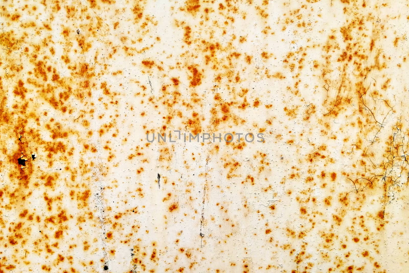 Spots on the paint. The textured background. View from the front.