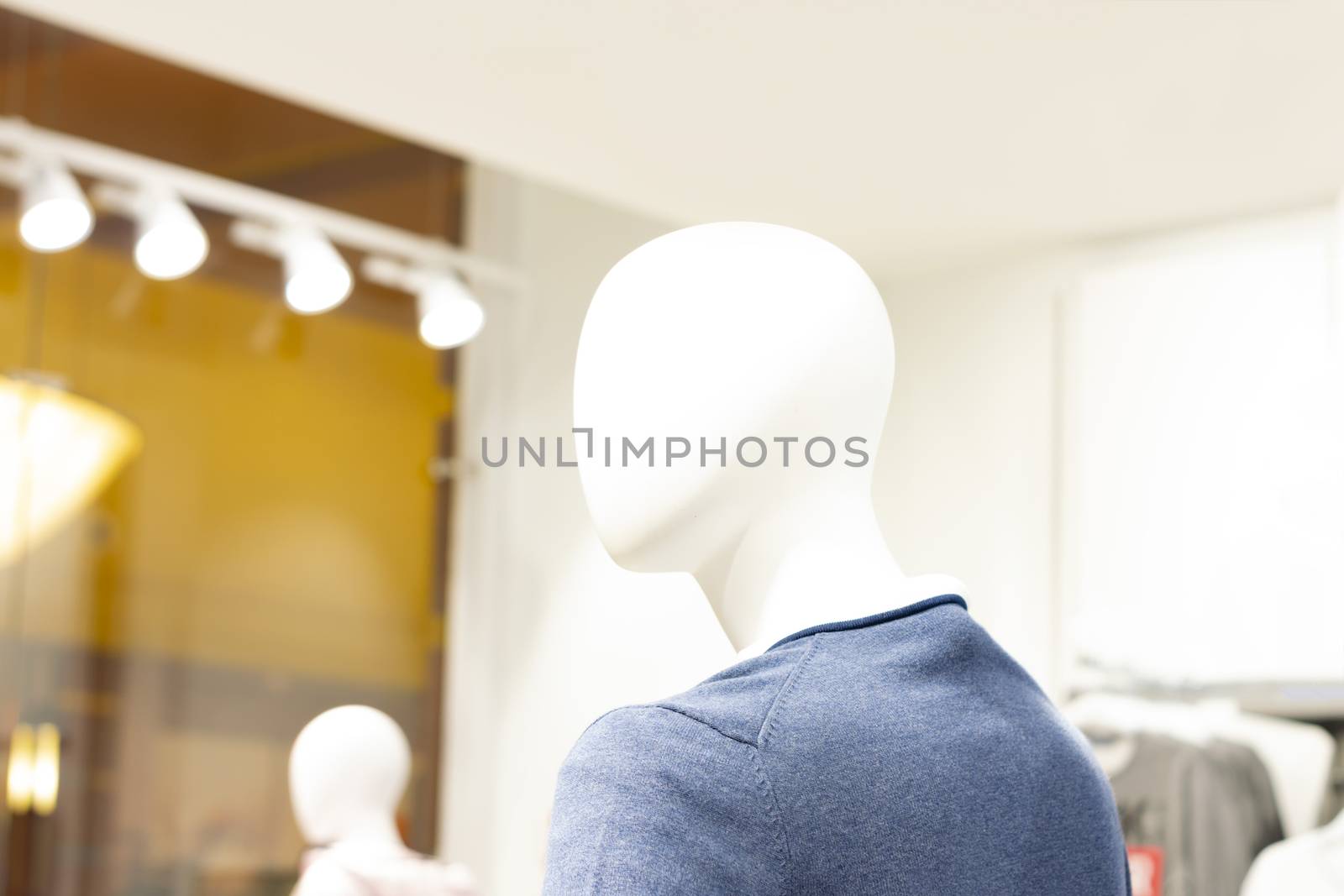female mannequin face at a shop.