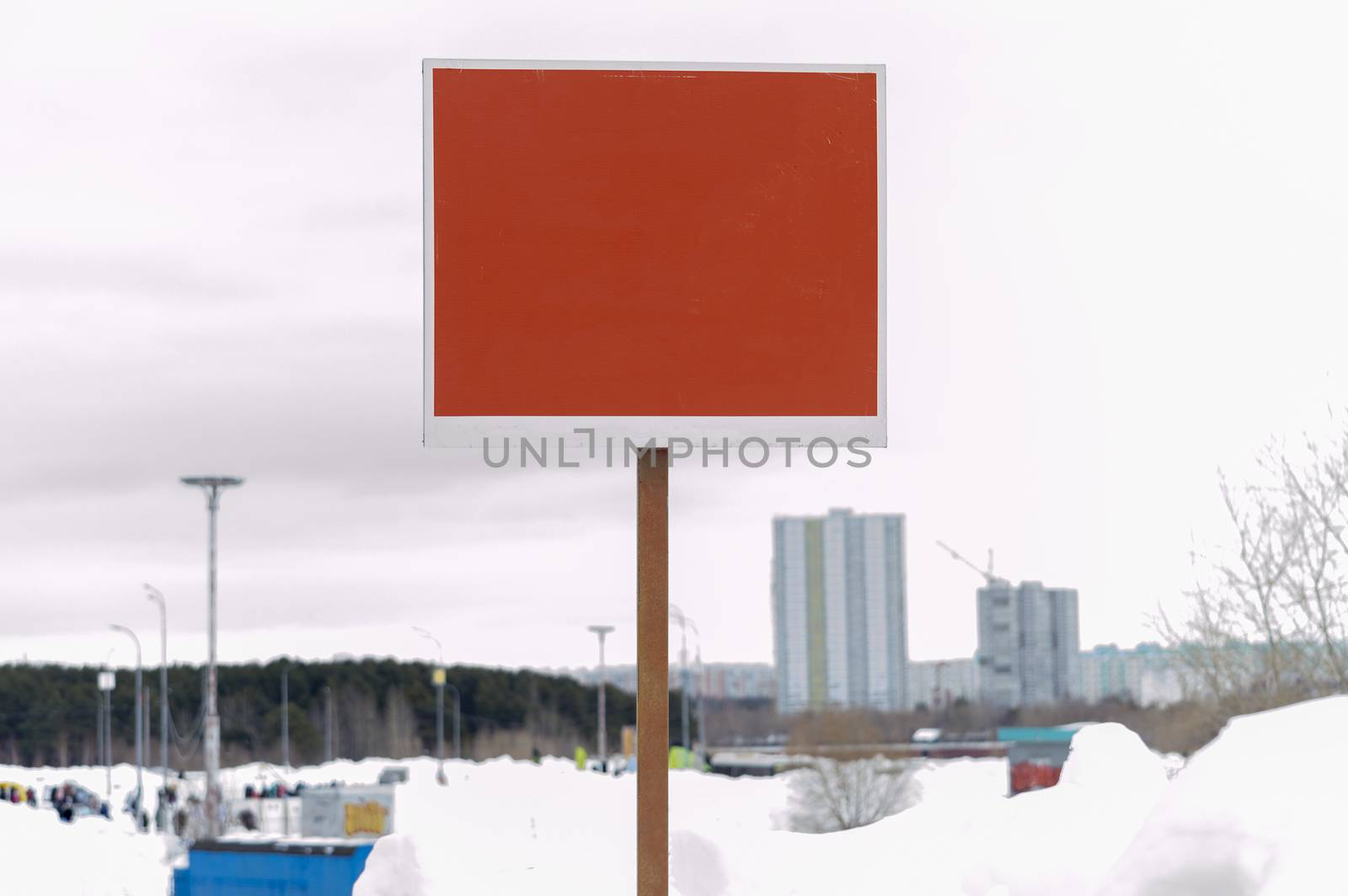 Billboard on the background of the winter city