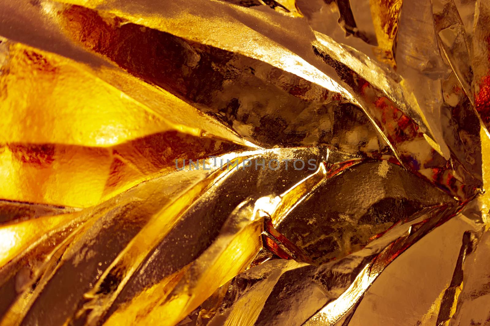 Yellow textured background made of ice