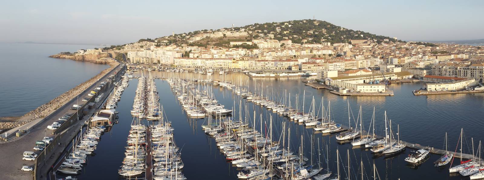Aerial panorama of the marina of the port of Sete on a summer morning, in Herault in Occitania, France by Frederic