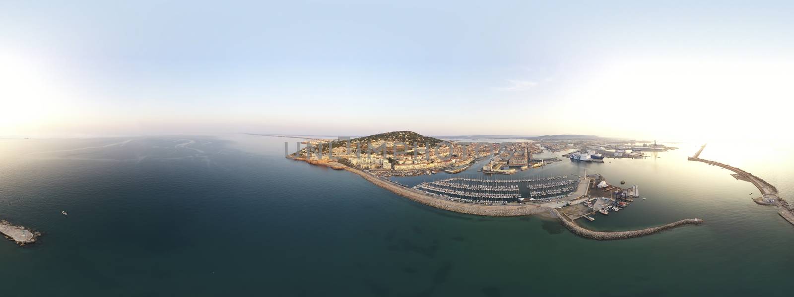 360º Aerial panorama of the city of Sète and the port, during sunrise, in the Hérault department in Occitanie, France by Frederic