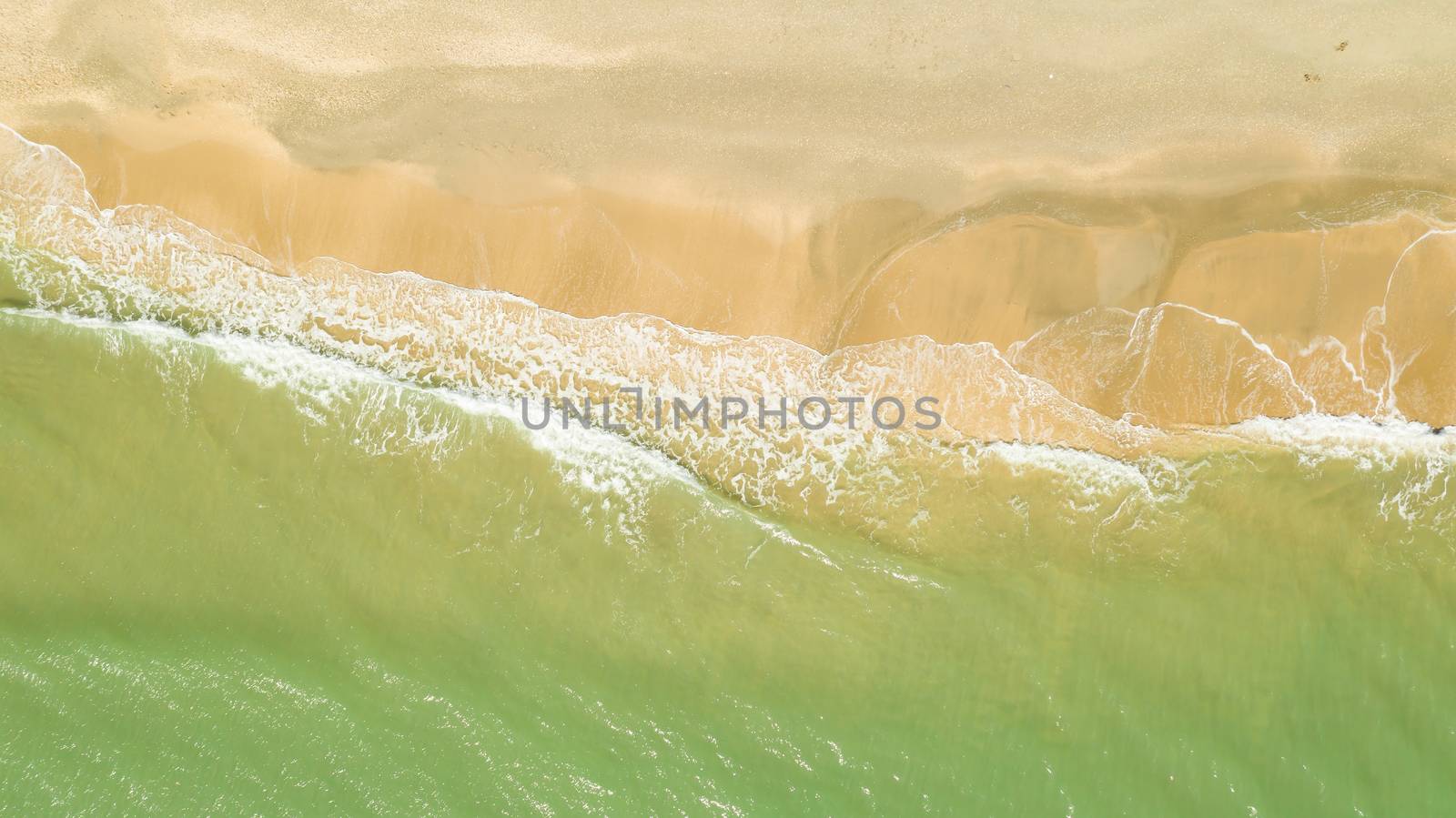 Aerial view of the beach and waves by Frederic