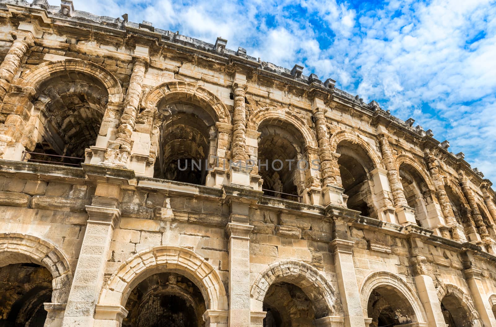 The arenas of Nîmes are a Roman amphitheater built towards the end of the 1st century in the French city of Nîmes, in the Gard.