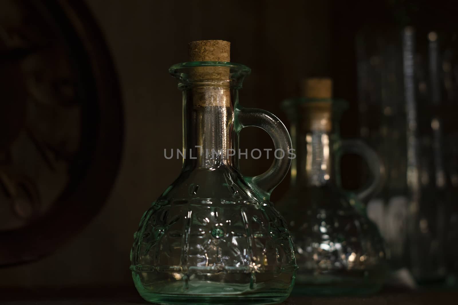 Glass vessels under olive oil.