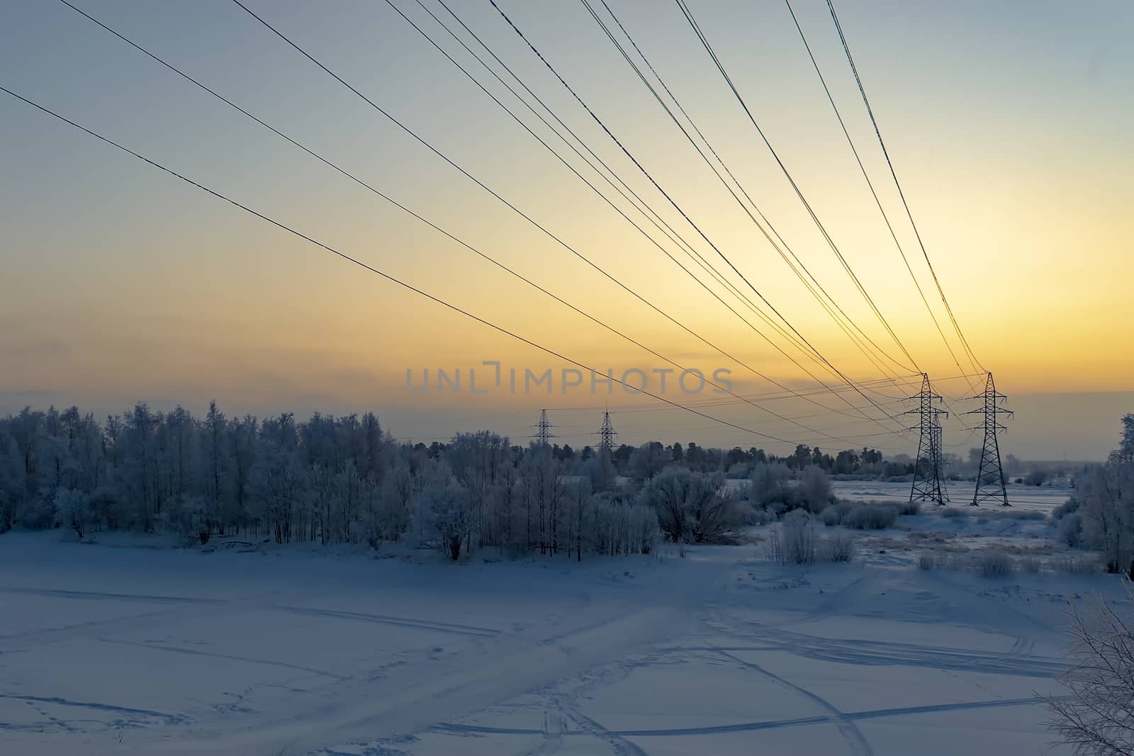 Evening industrial landscape winter. Siberia.