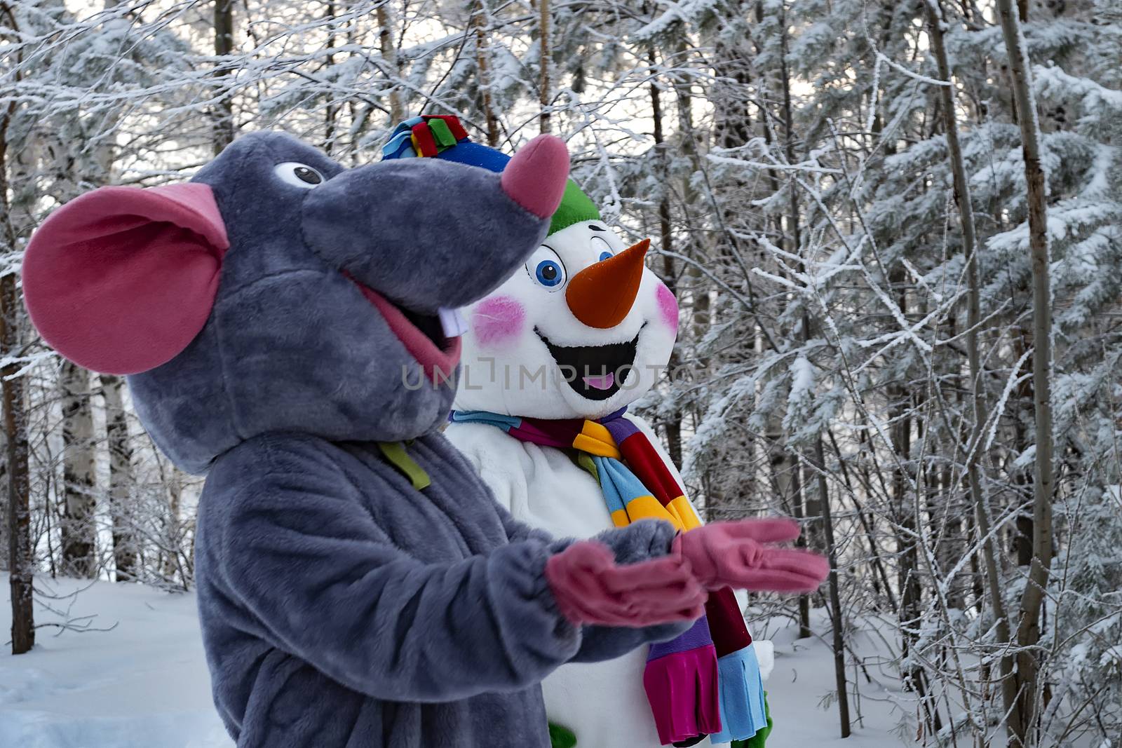 Animators in textile mouse and snowman costume.