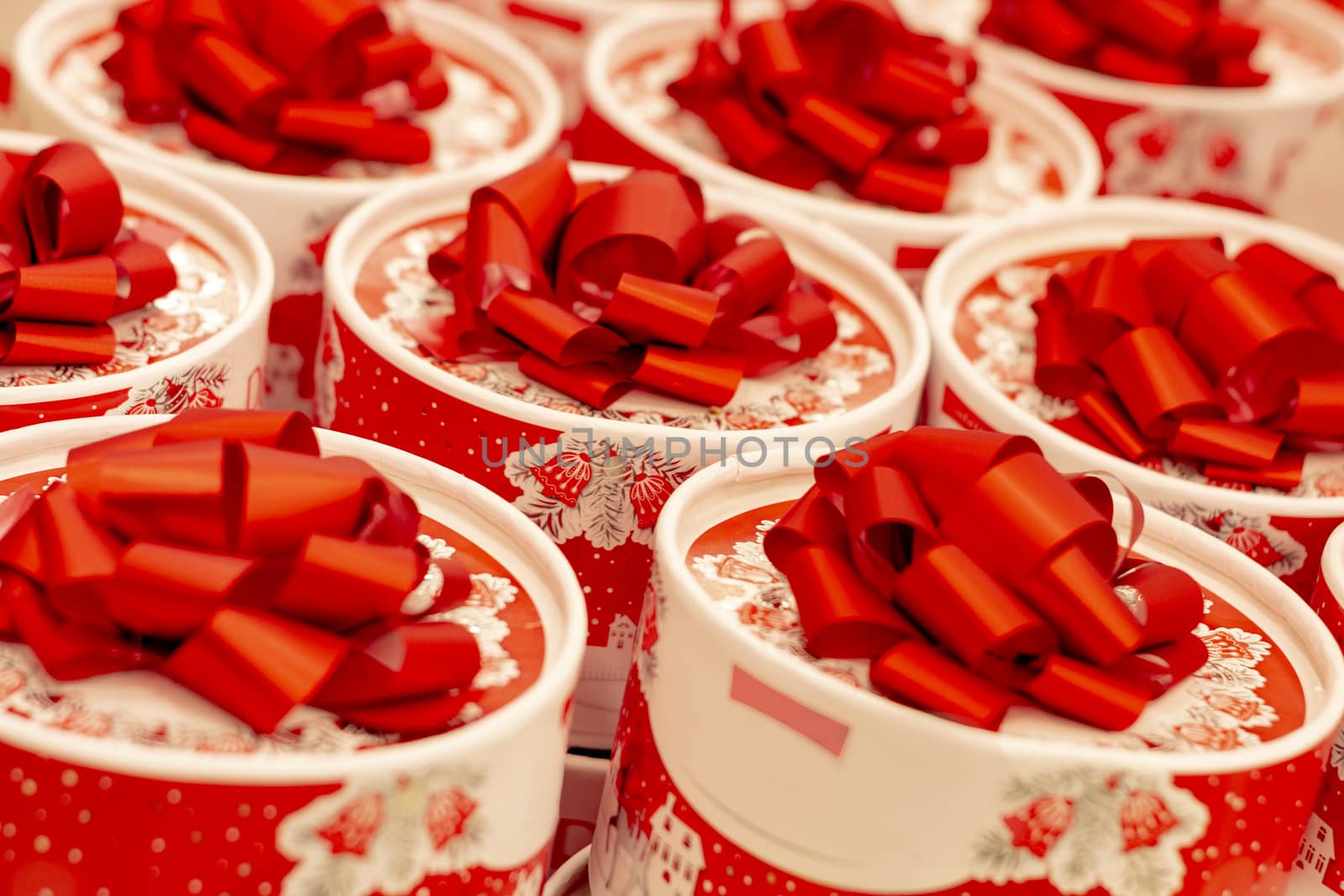 Round the boxes with bows on lid. Candys for love you. Winter