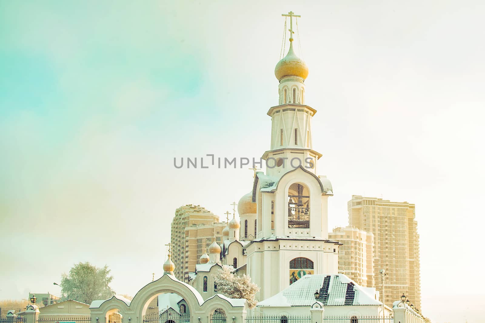 Orthodox church with a bell tower in the foreground. View from the front.