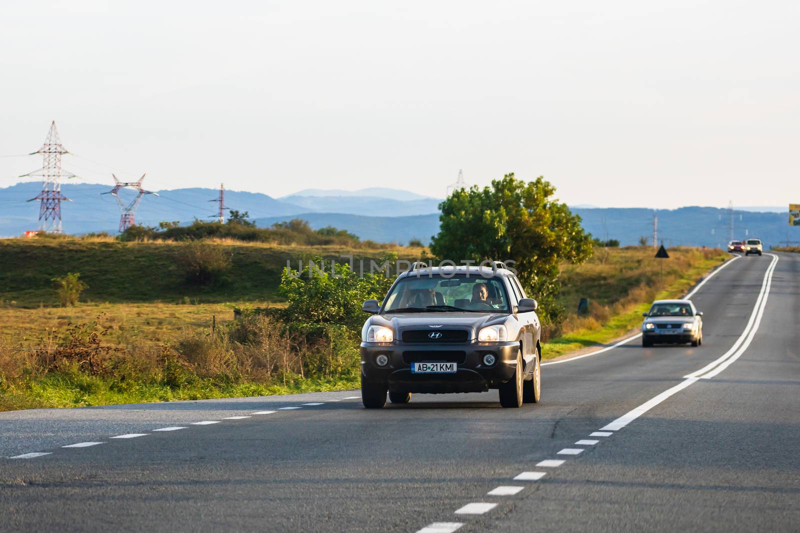 Traveling Hyundai car in motion on asphalt road, front view of car on street. Bucharest, Romania, 2020