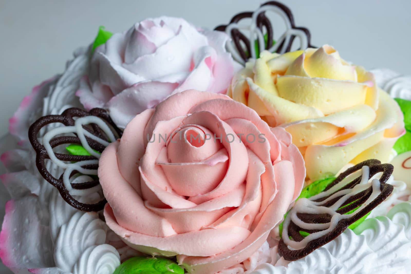 Sweet cream on the cake in the form of colorful roses by lapushka62