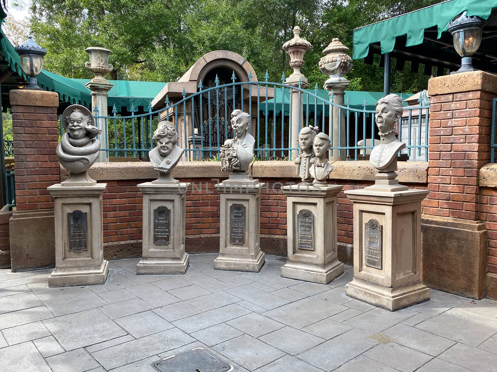 Orlando,FL/USA-10/21/20: The statues of ghosts outside of the Haunted Mansion ride in the Magic Kingdom at  Walt Disney World Resorts in Orlando, FL.