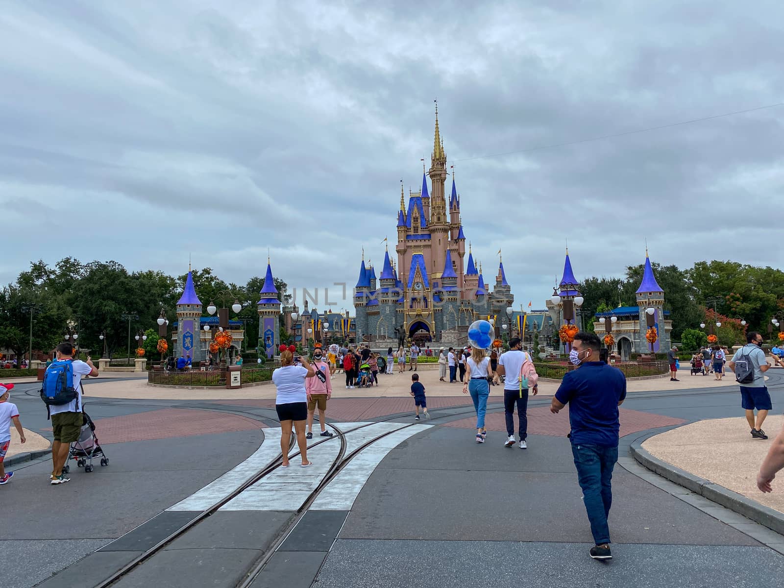 Orlando,FL/USA-10/21/20: People walking up to Cinderella's Castle in the Magic Kingdom at  Walt Disney World Resorts in Orlando, FL.