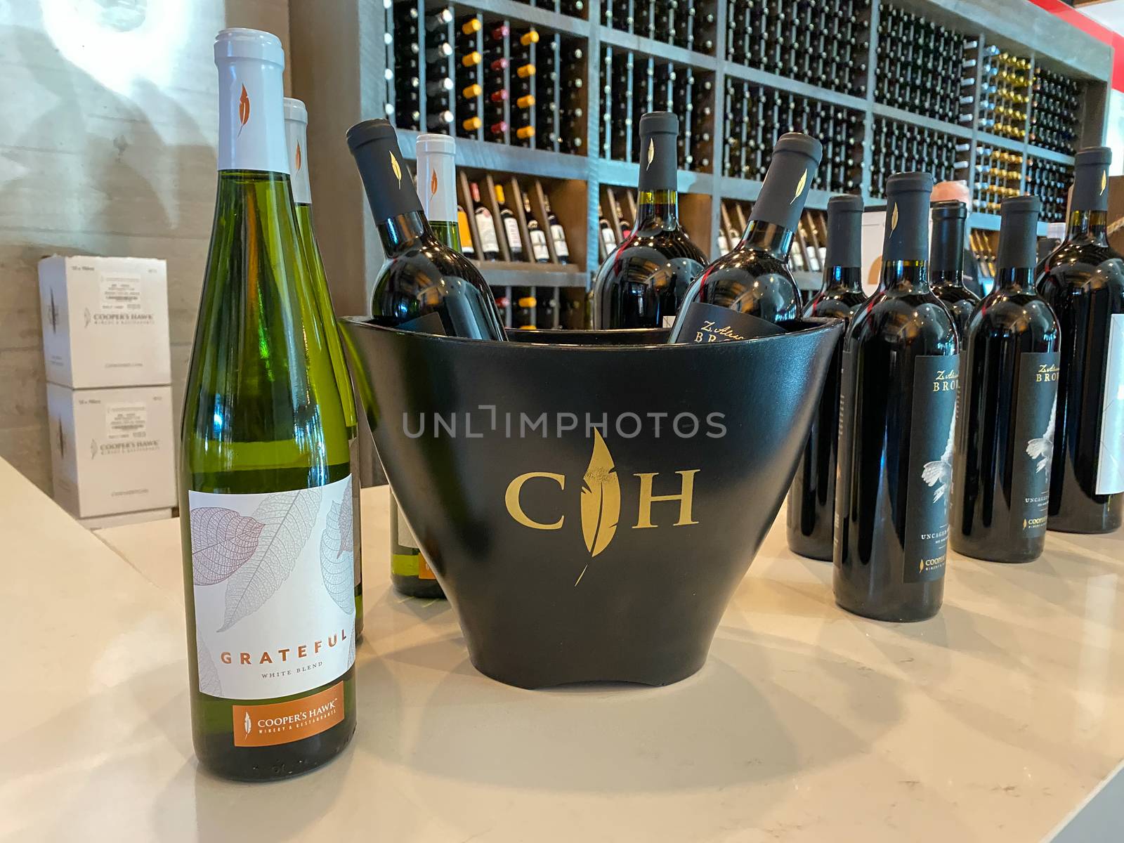 Naples, FL/USA - 10/30/20: Bottles of wine at a Coopers Hawk Wine bar and restaurant in Naples, Florida.