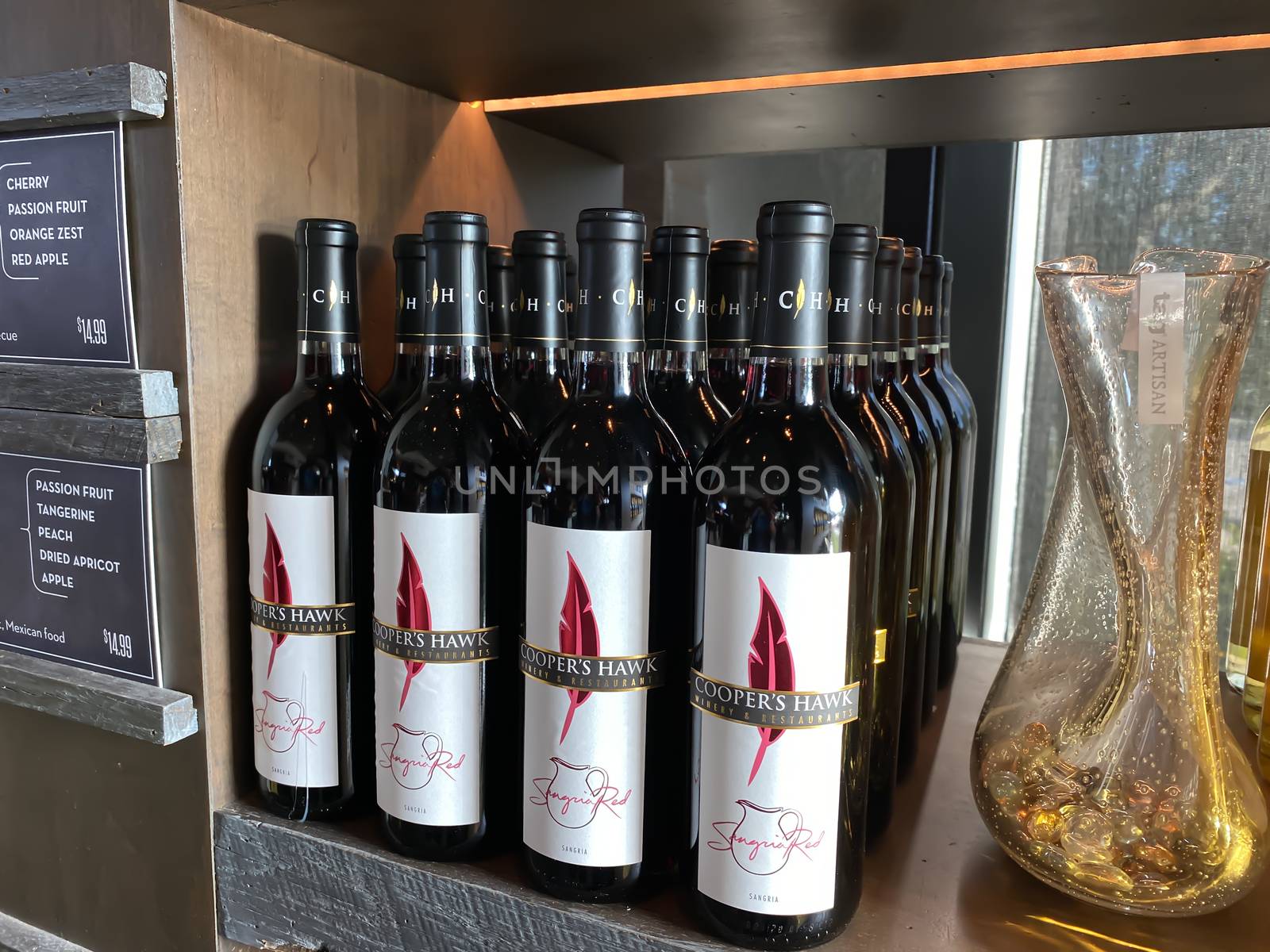 Naples, FL/USA - 10/30/20: Bottles of Sangria Red wine at a Coopers Hawk Wine bar and restaurant in Naples, Florida.