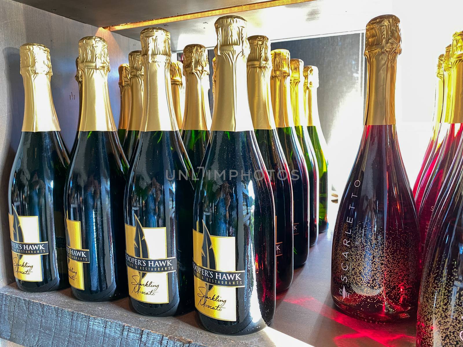 Naples, FL/USA - 10/30/20: Bottles of Sparkling Moscato wine at a Coopers Hawk Wine bar and restaurant in Naples, Florida.