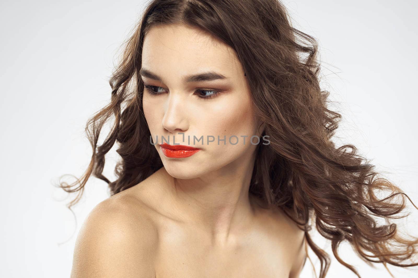 Beautiful woman with drawn swords bright makeup glamor close-up light background by SHOTPRIME