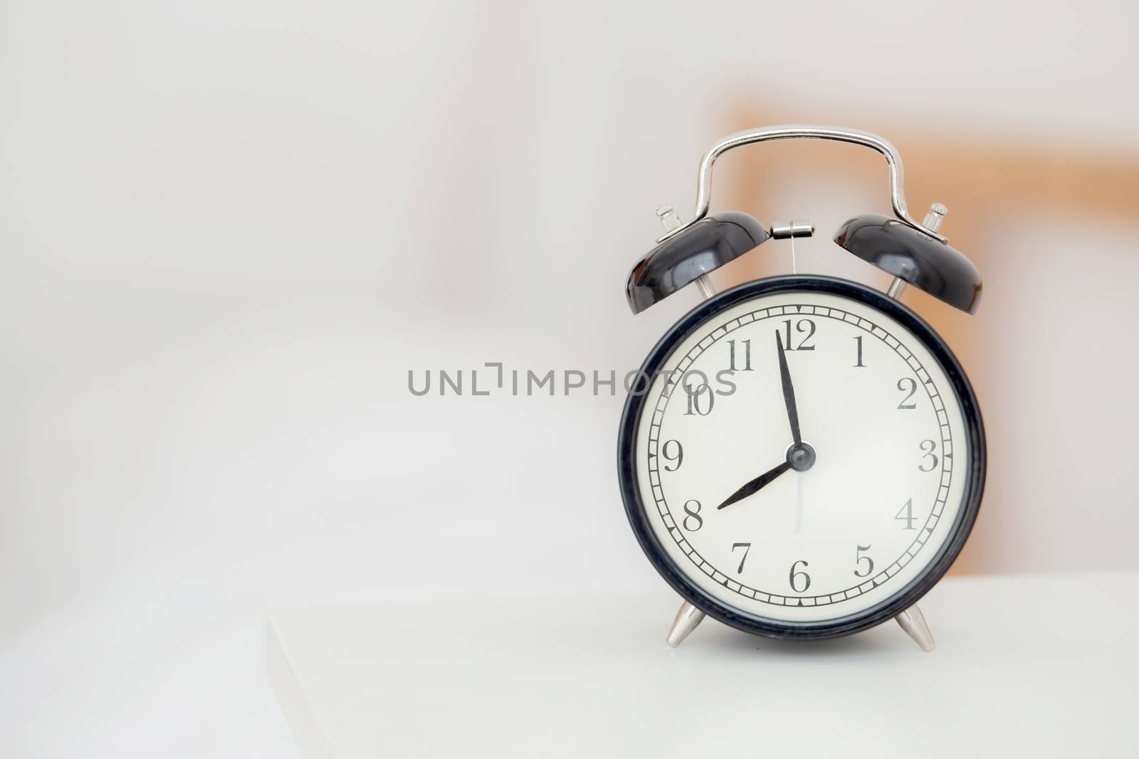 closeup alarm clock and beautiful asian young woman in morning,  by nnudoo