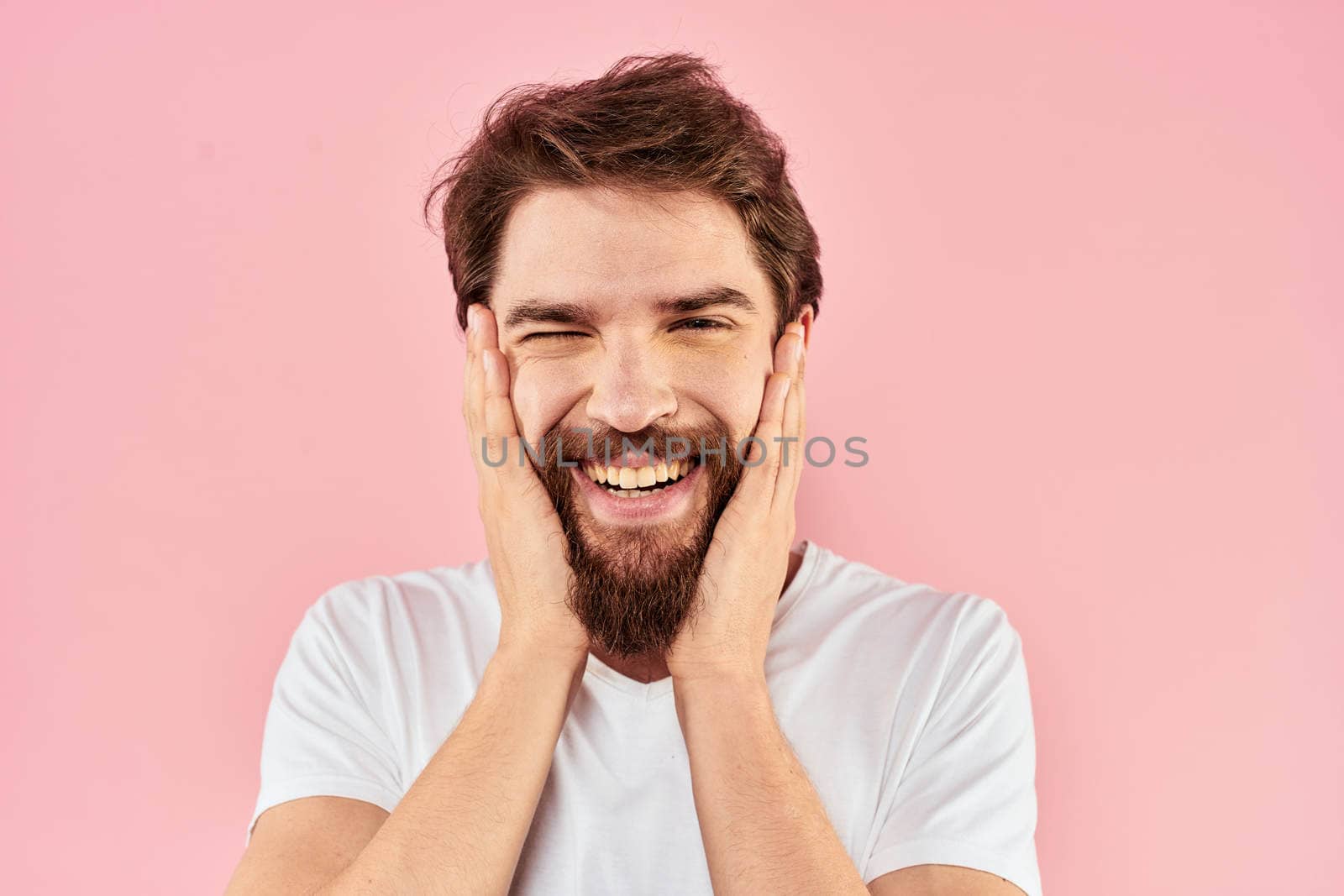 Bearded man white t-shirt cropped view lifestyle studio pink background by SHOTPRIME
