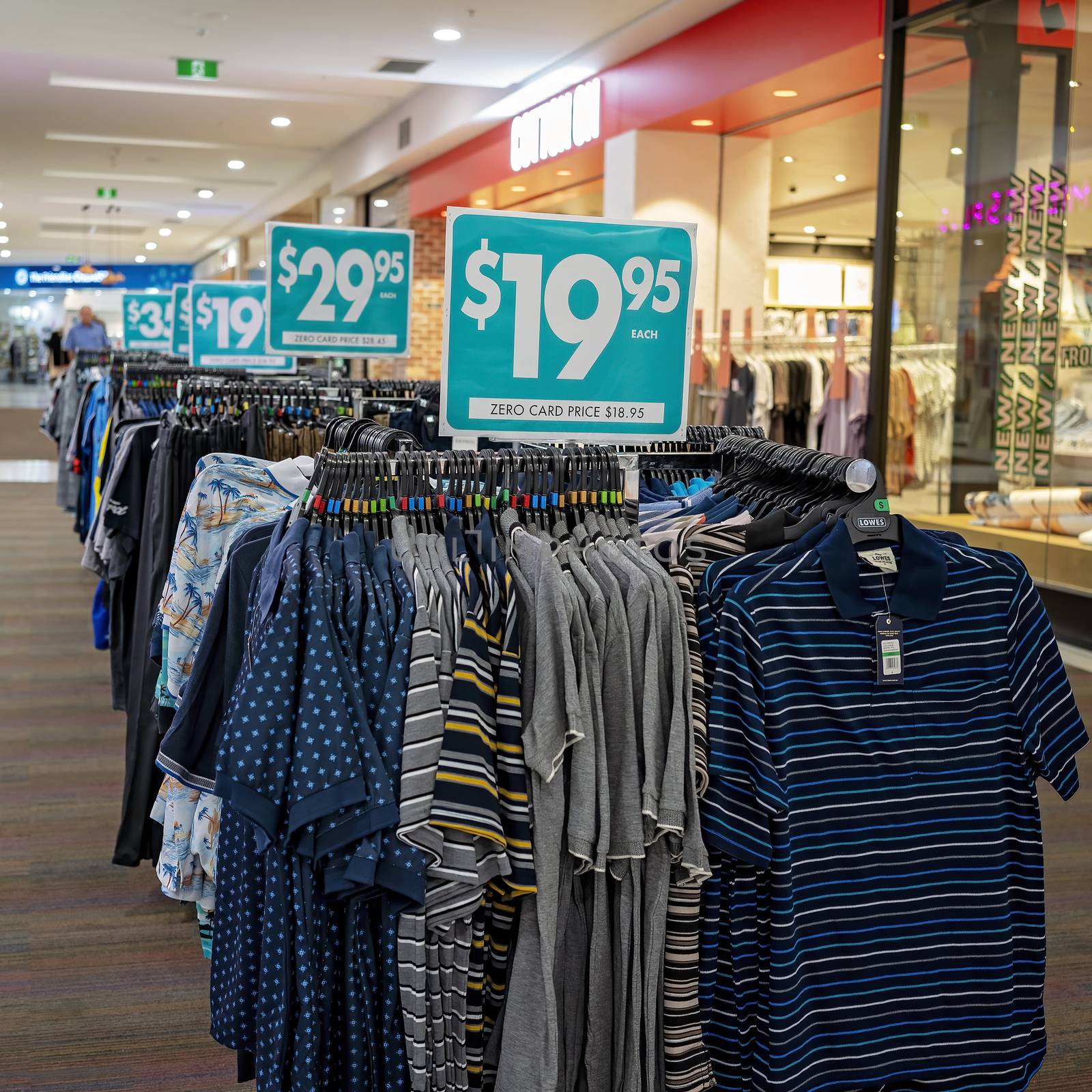 Townsville, Queensland, Australia - October 2020: Mens casual shirts for sale on racks in a city shopping center