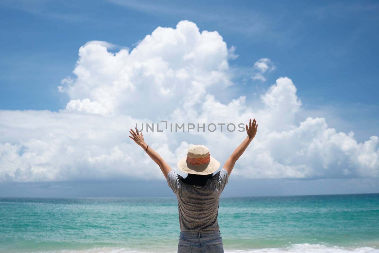 Woman travel around the world with summer beach freedom and relax life concept.