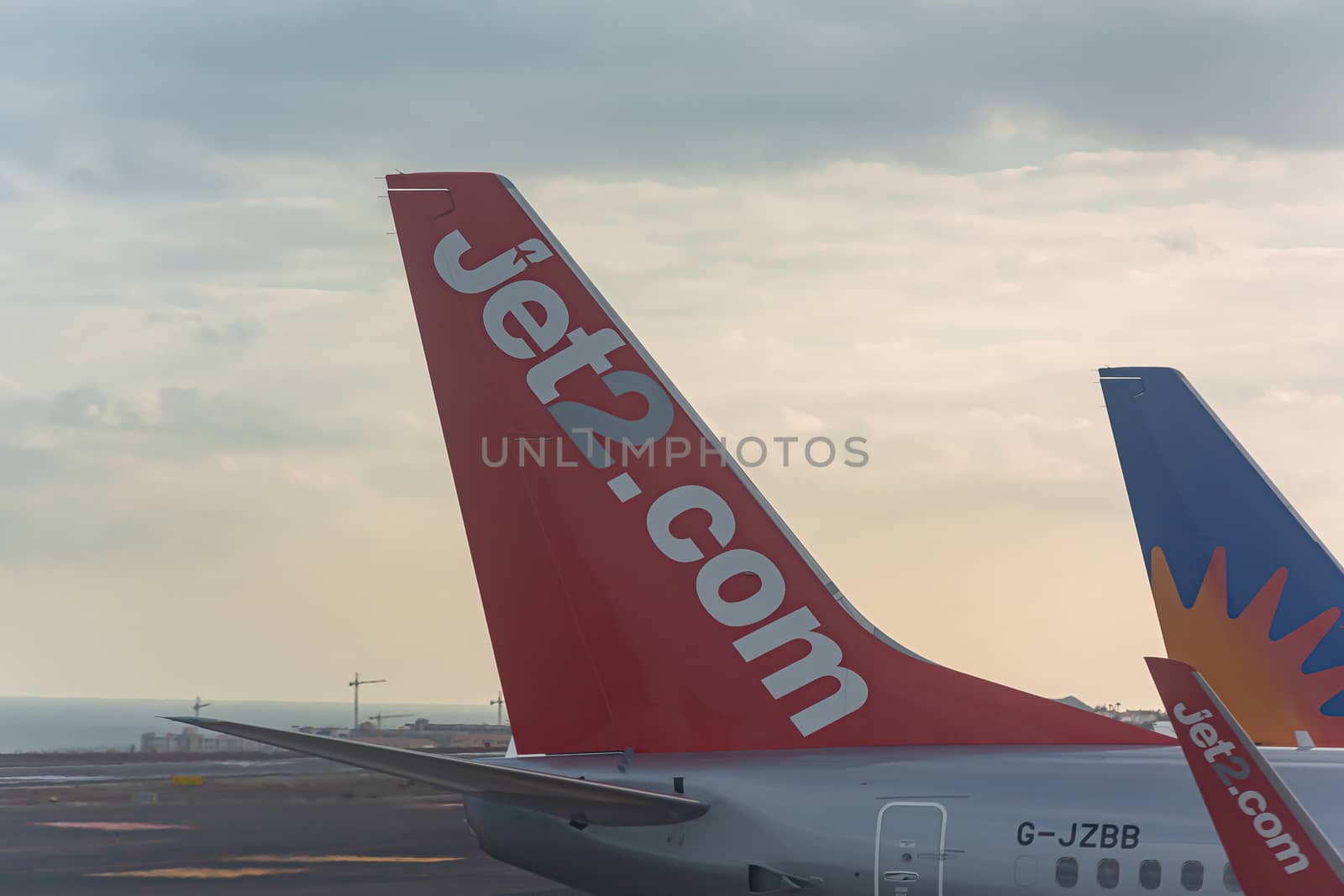 Spain, Tenerife - 05/19/2018: Tail unit of JET2 airline by Grommik