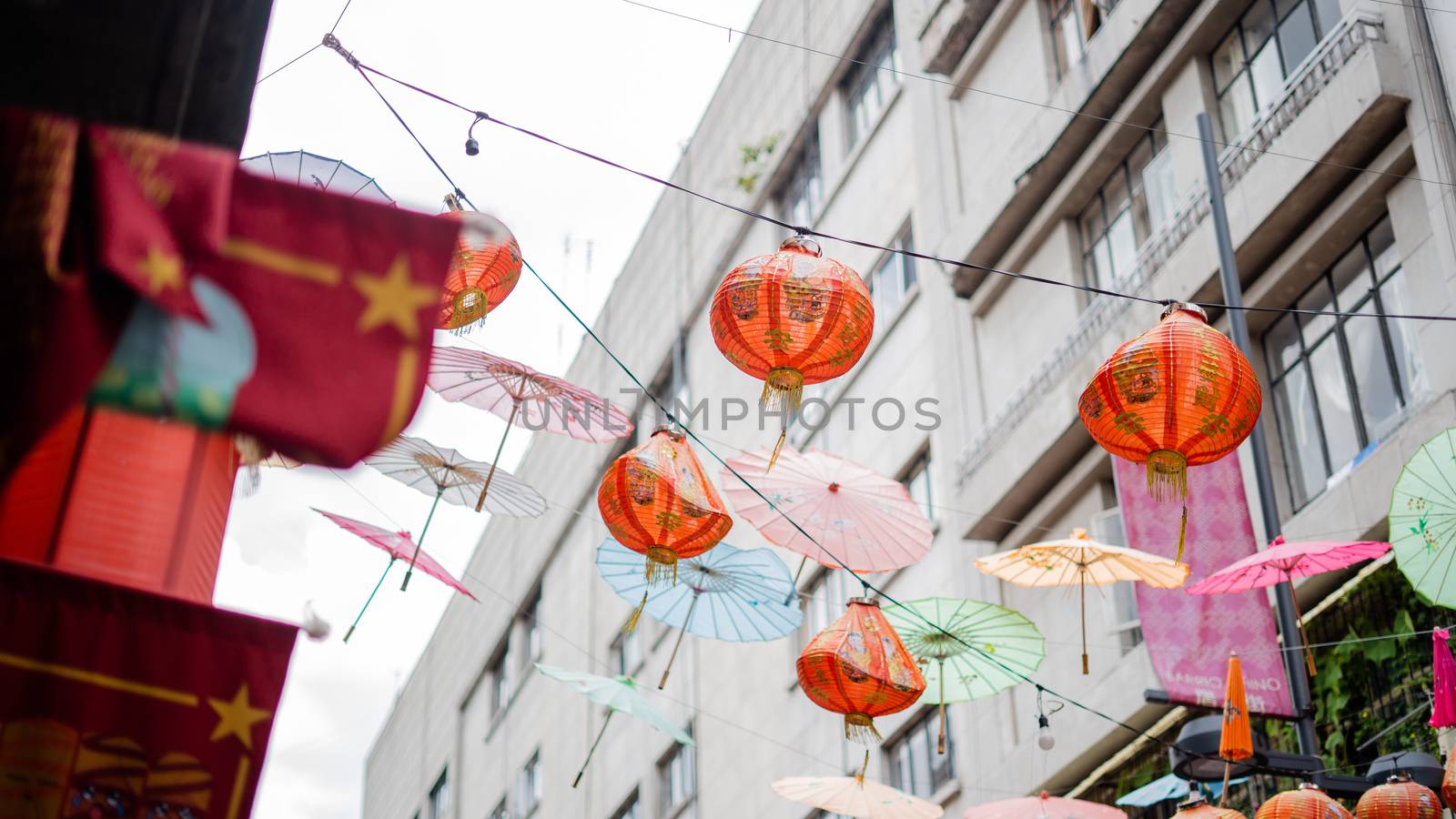 Picture of Traditional red Chinese Lamps Hanging from cables in an Alley