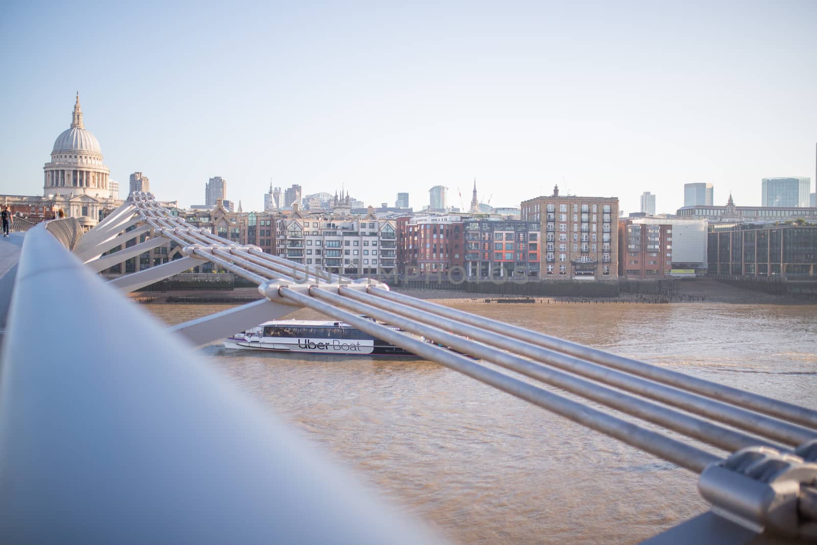 Landscape View of Millenium Bridge Handrail Leading to St Pauls Cathedral in London, UK