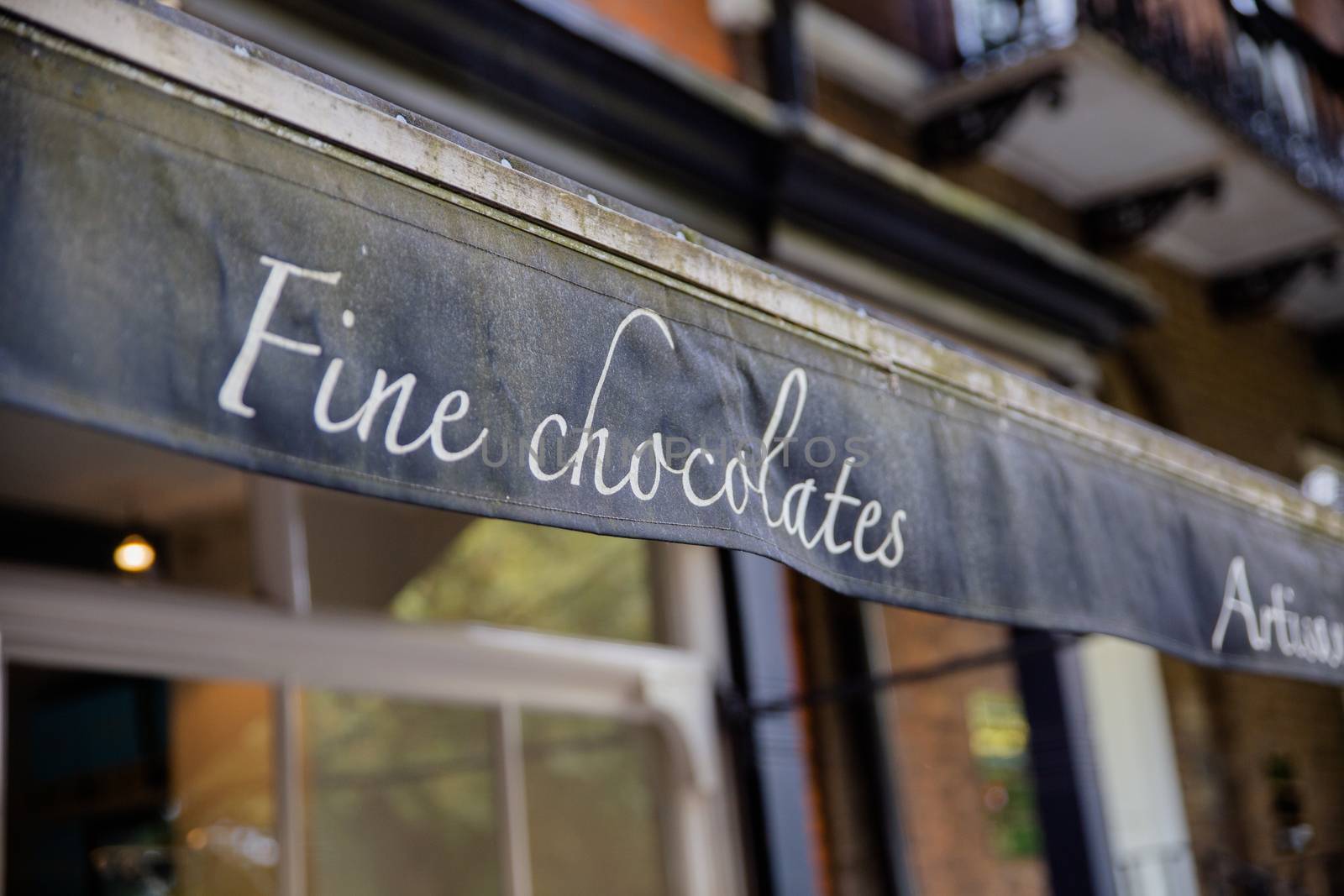Up-close Picture of the Dark Blue Business Awning of a Fine Chocolates Shop From London, Uk