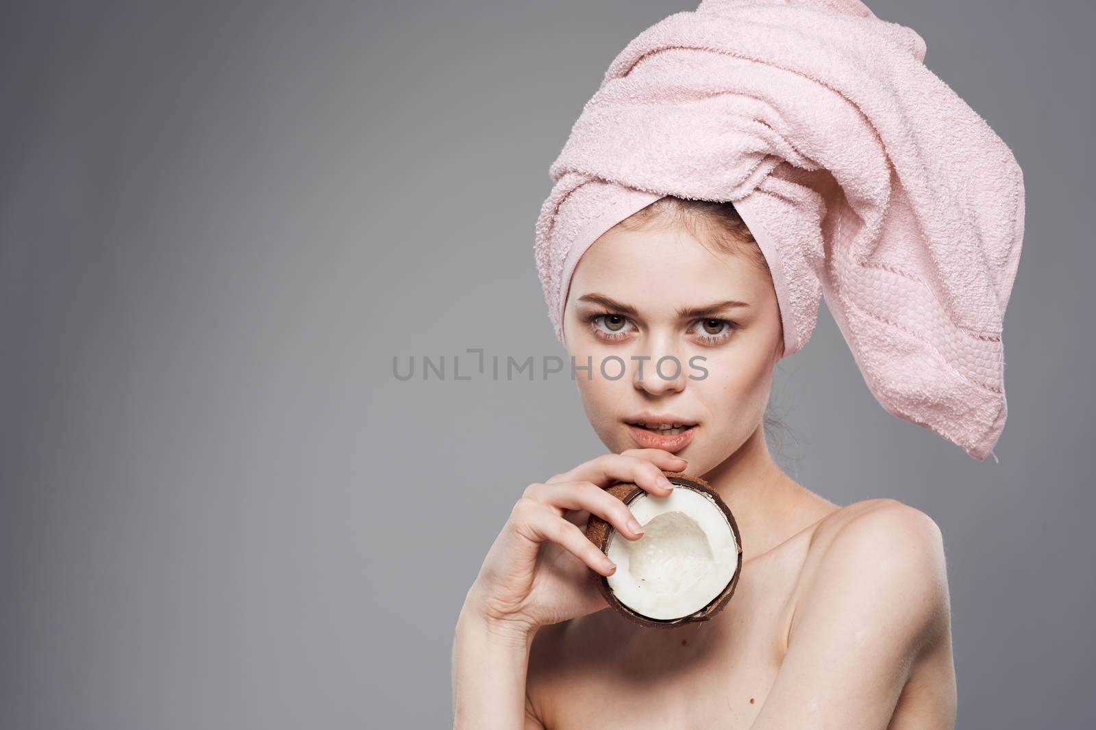 beautiful woman with coconut in her hands skin care tropics natural cosmetics by SHOTPRIME