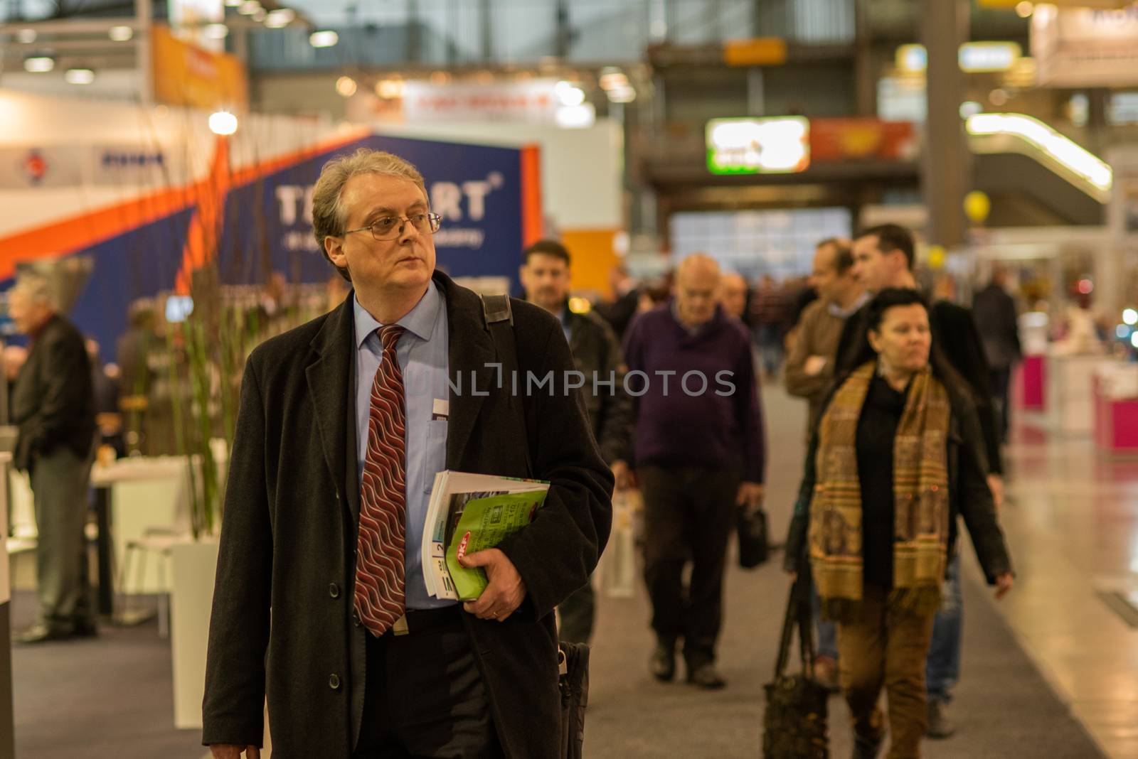 Man reading a report during a convention at the Brno Exhibition Center (BVV trade fairs brno)
