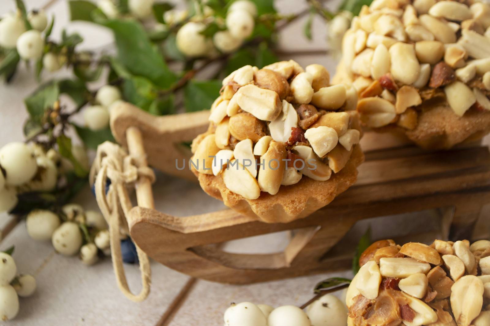 Muffins with peanut nuts close up, Christmas holiday decoration