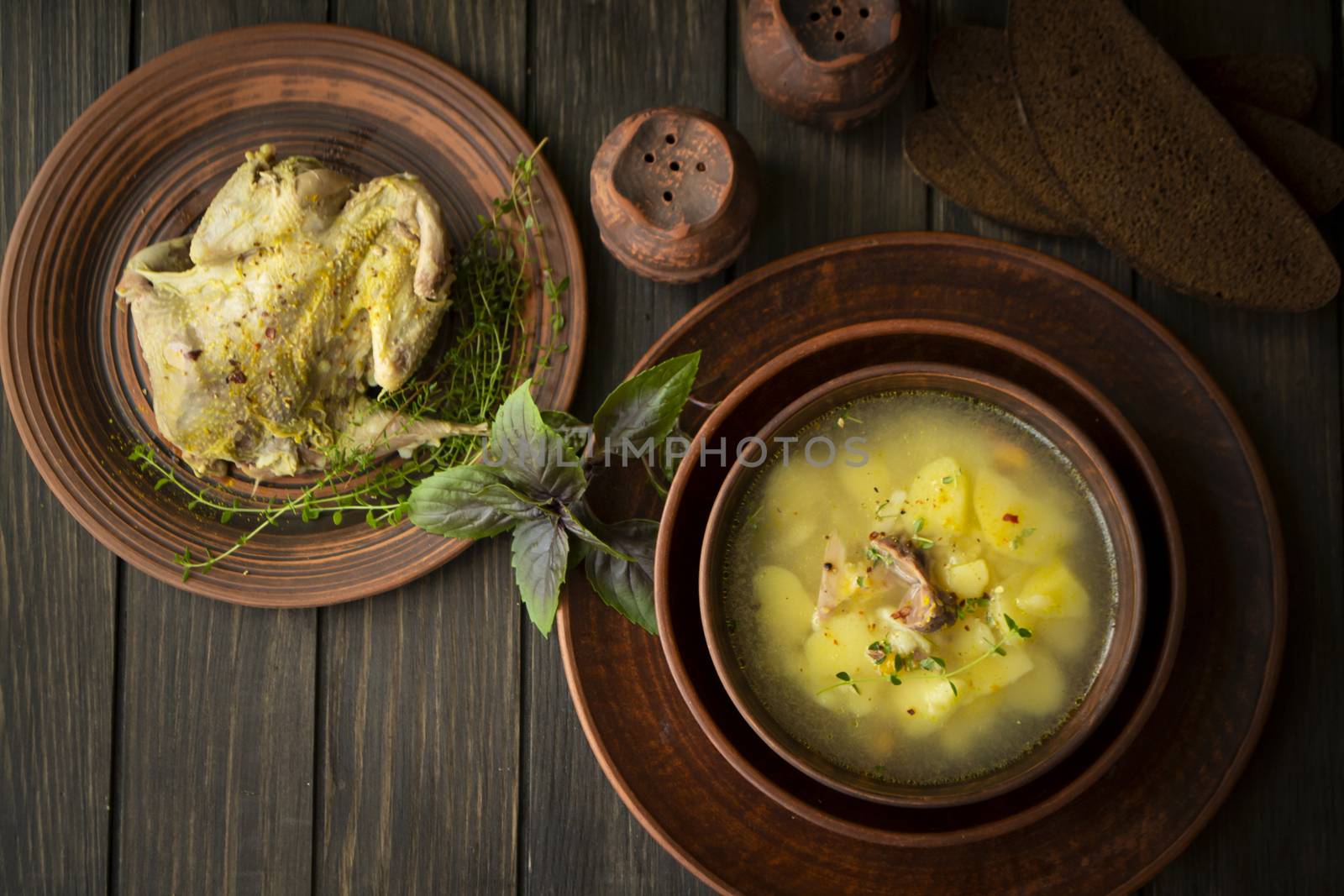 Wild partridge meat on kitchen, cooking gourmet wild game bird. Healthy diet recipe. Soup. Top view