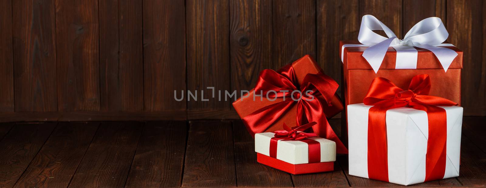 Gift boxes on wooden background Christmas New Year Advent birthday celebration, copy space for text