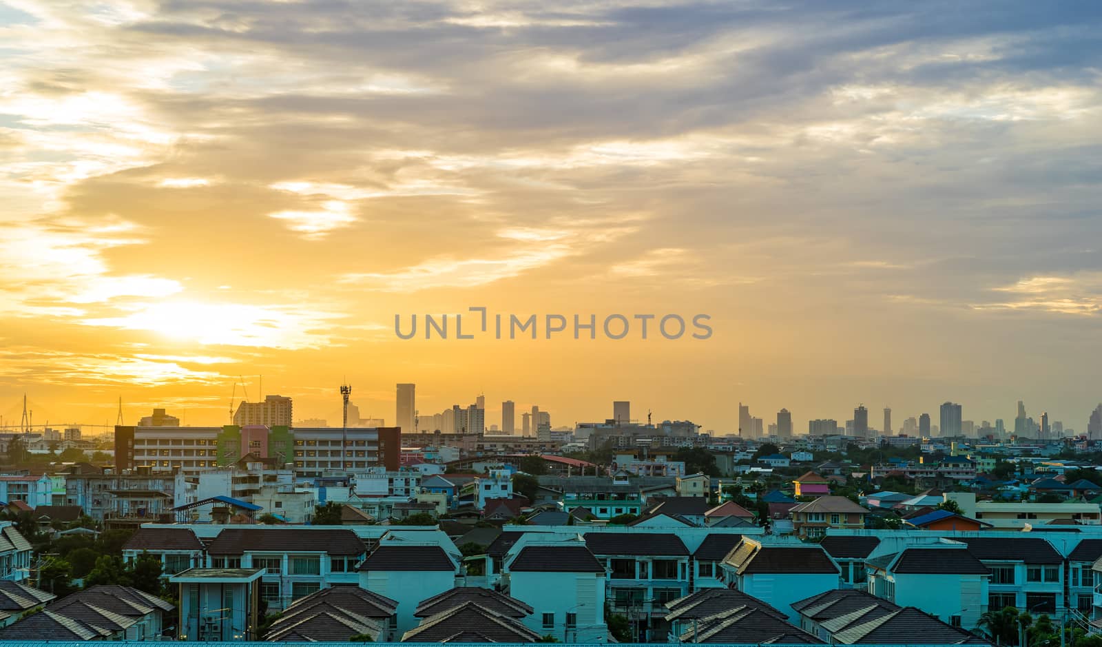 Cityscape and sunset  at evening time by domonite