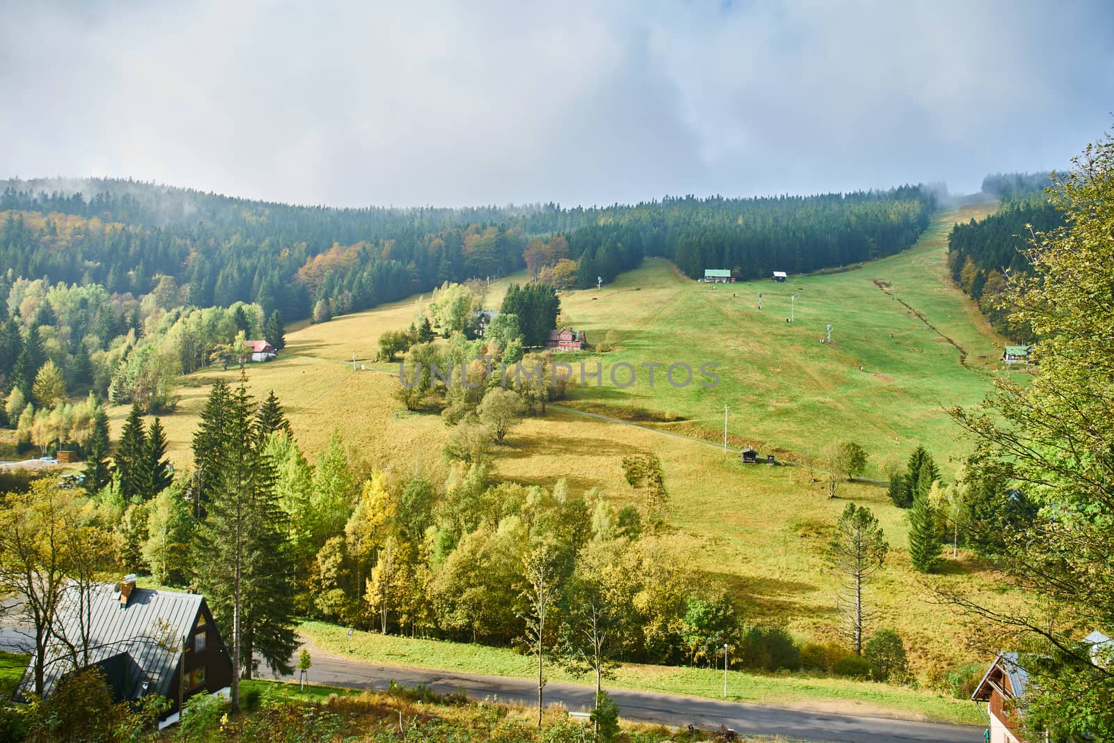pastures and ski slopes in Harrachov during sunny autumn day by Jindrich_Blecha