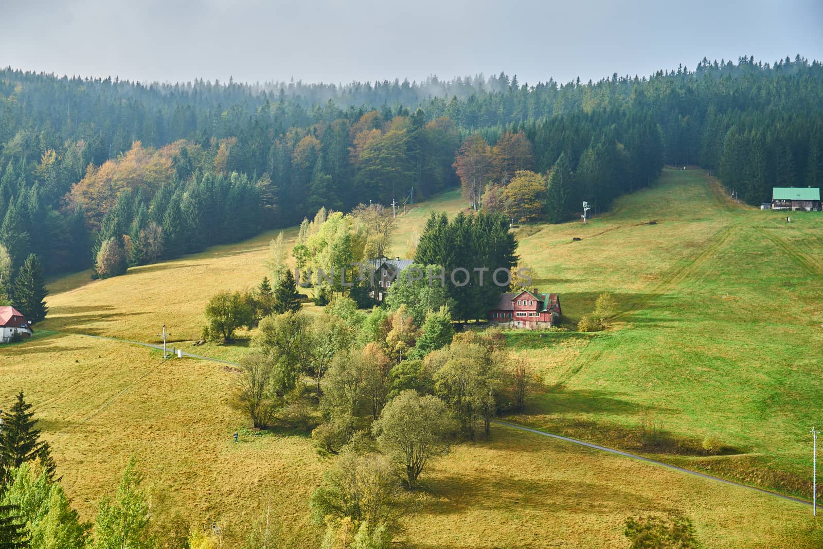 pastures and ski slopes in Harrachov during sunny autumn day