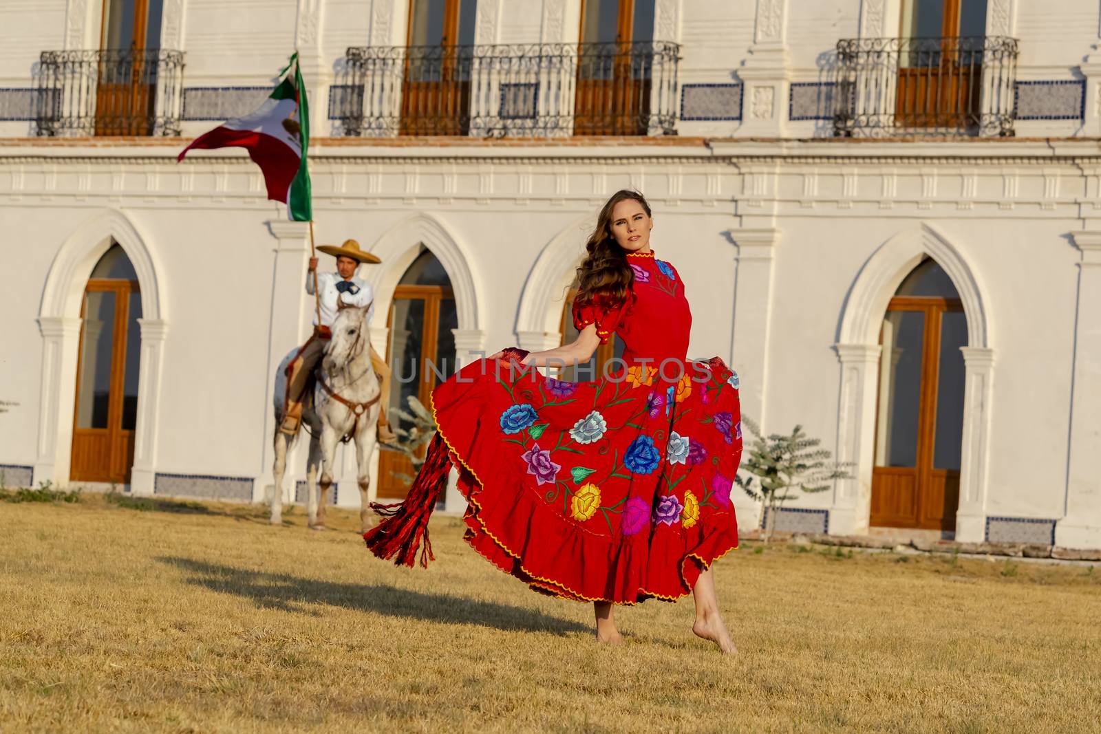 A gorgeous Hispanic Brunette model poses outdoors in home environment