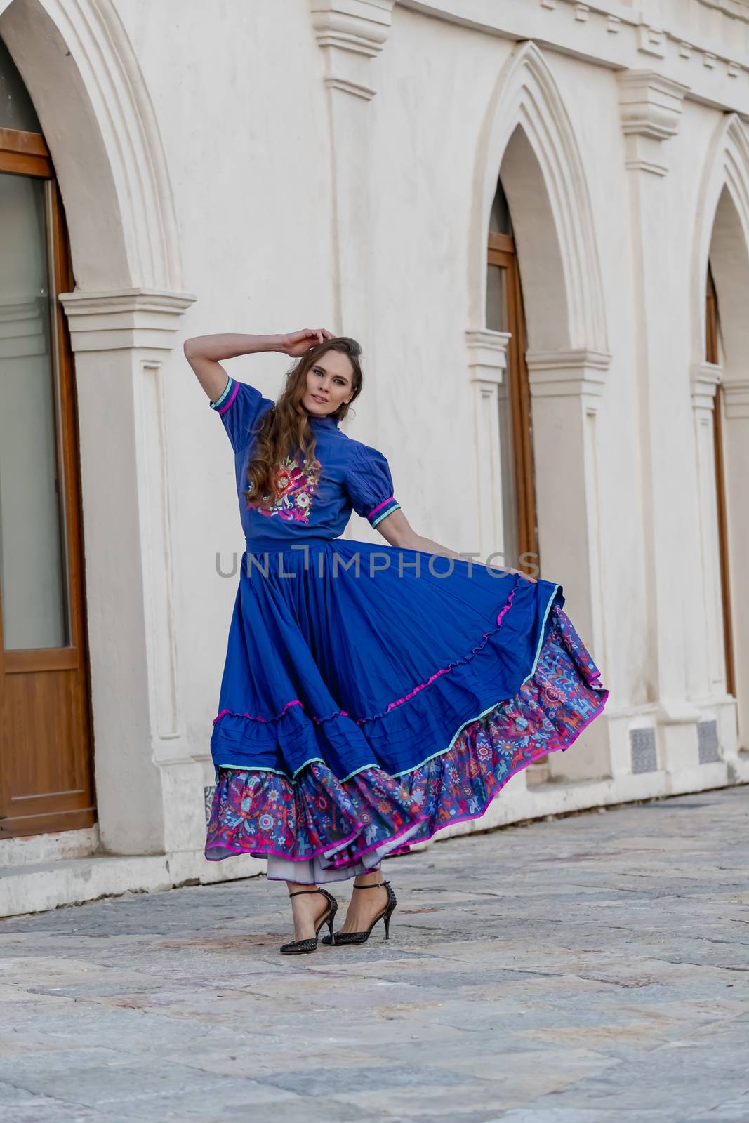 A Lovely Hispanic Brunette Model Poses Outdoors On A Mexican Ranch by actionsports